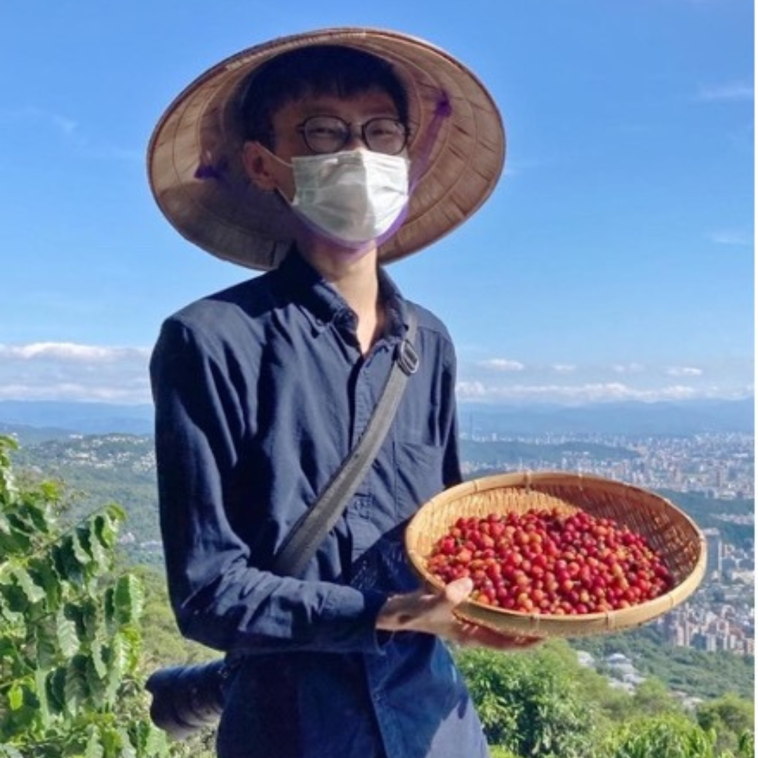 Young man holding fruits